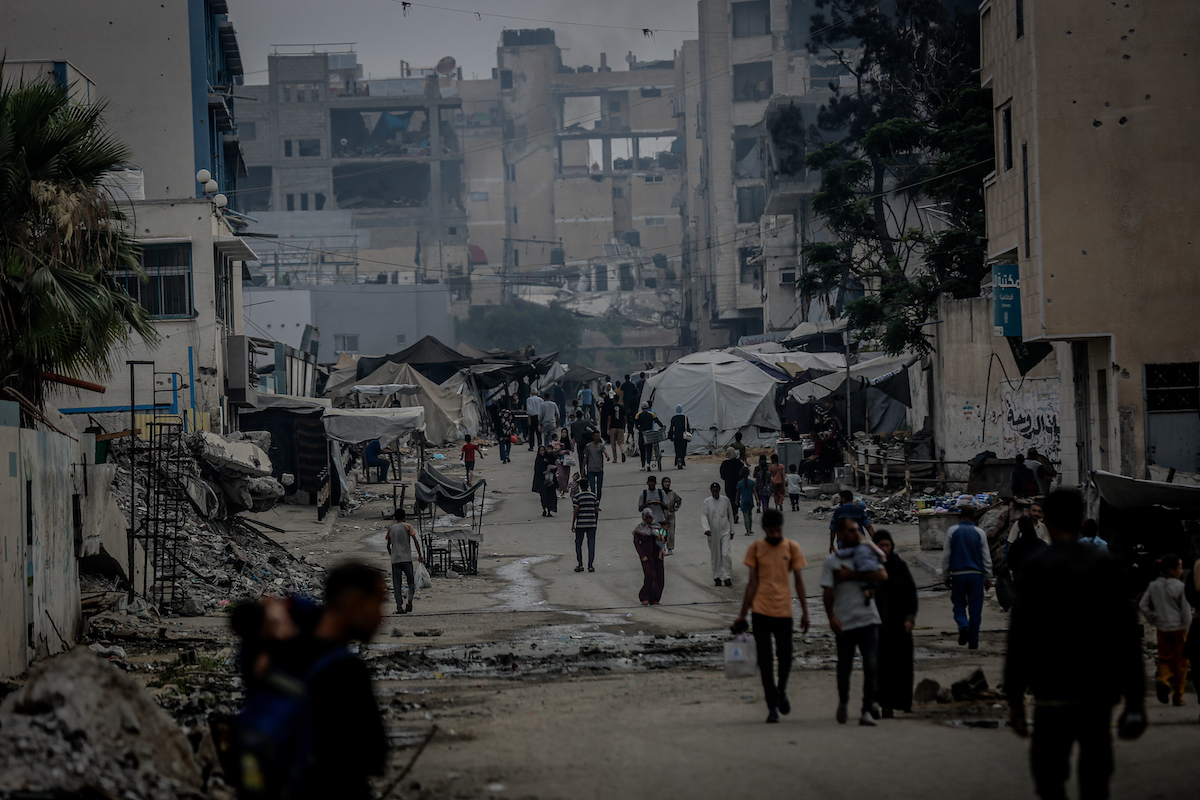 يحاول الفلسطينيون مواصلة حياتهم اليومية وسط هجمات إسرائيلية في مدينة غزة ، غزة في 22 يونيو 2025.
