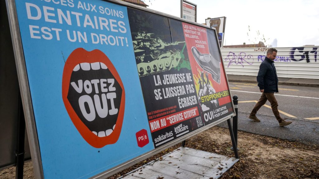 يرفض الناخبون السويسريون الخدمة الوطنية الإلزامية للنساء وضريبة الميراث الجديدة