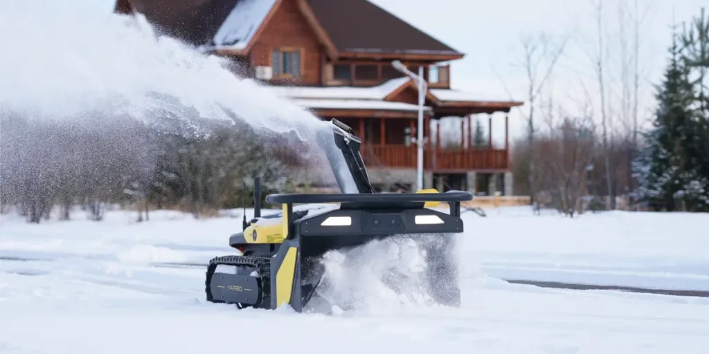 رجل في نيوجيرسي يستمتع بالمدفأة بينما تزيل آلة ثلج ذاتية القيادة مدخل منزله: “نشاهد الأولمبياد”